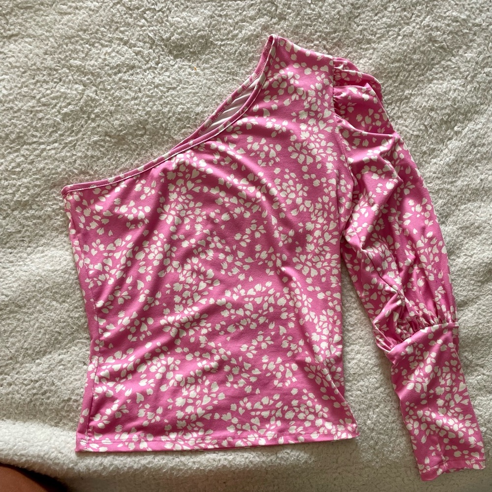 Cute off the shoulder top bought from a boutique. Has cuff look at end of sleeve